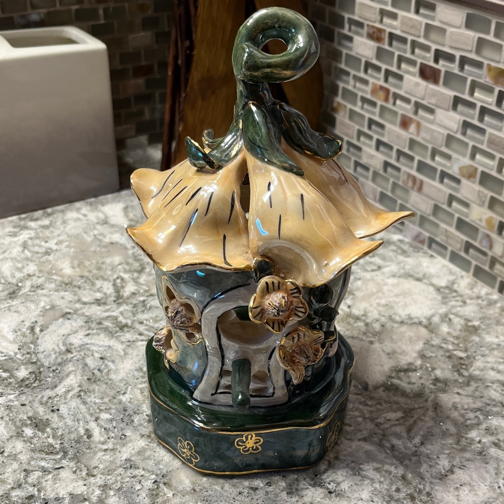 Music box tea light holder